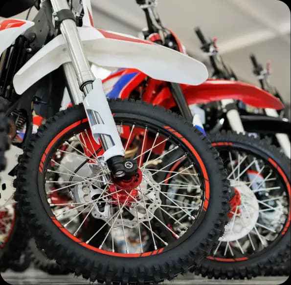 Off-road motorcycles parked in a row