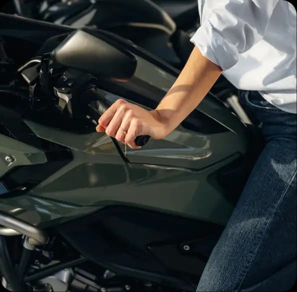 Person seated on a motorcycle