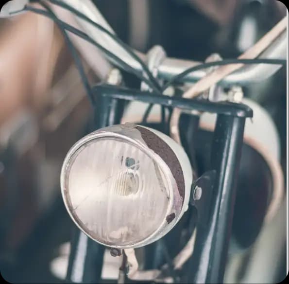 Motorcycle headlight and handlebars