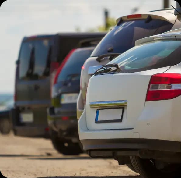 Rear ends of parked vehicles