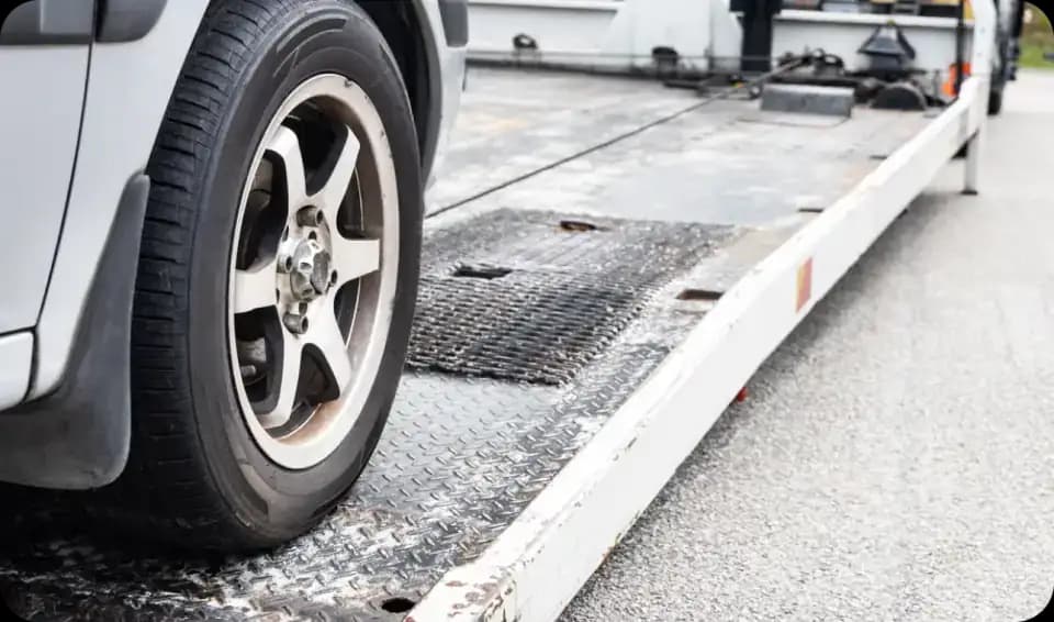 Vehicle wheel on a loading ramp
