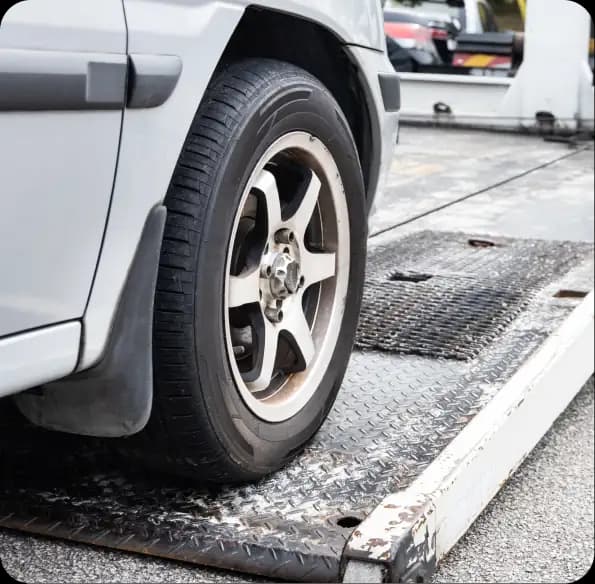 Vehicle wheel on a loading ramp