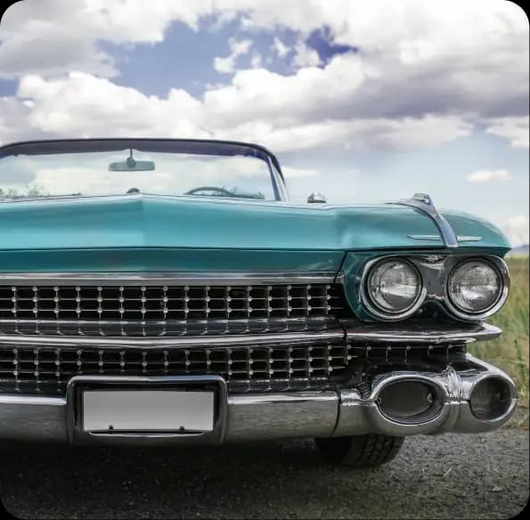 Front of a turquoise classic convertible