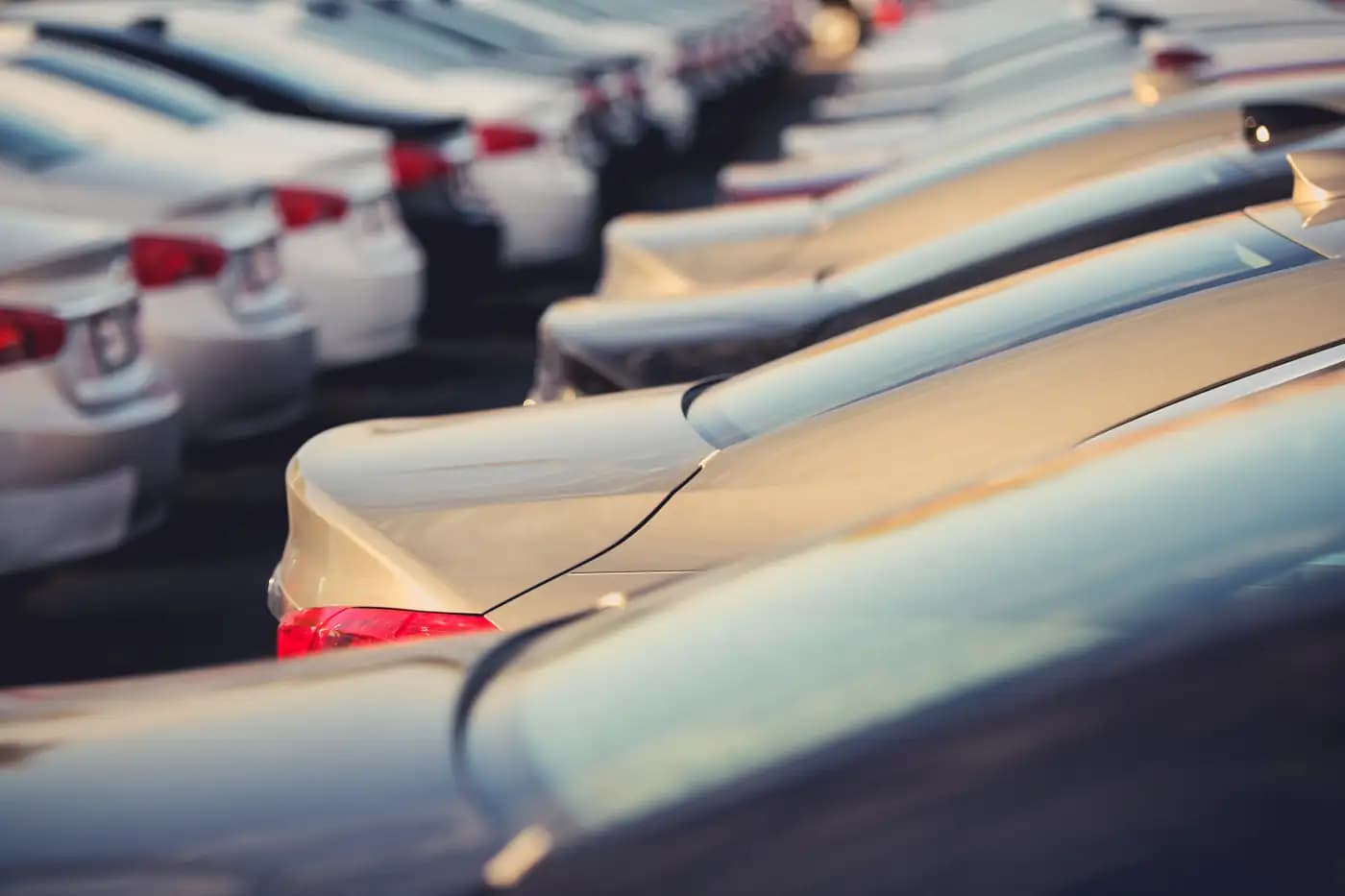 Rows of cars in a parking lot