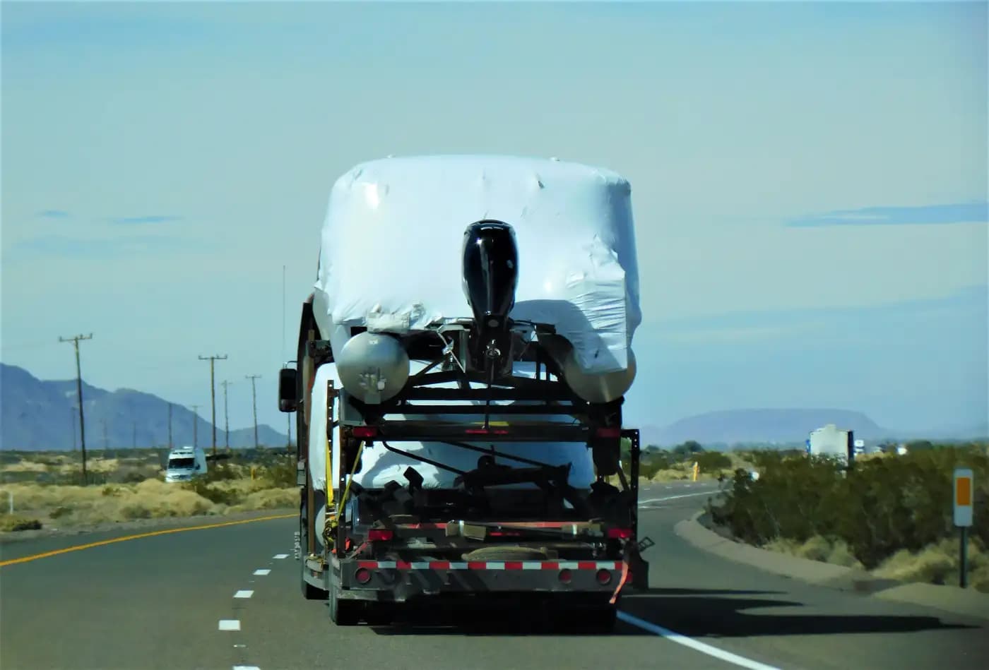 Rear view of a truck cab loaded for transport