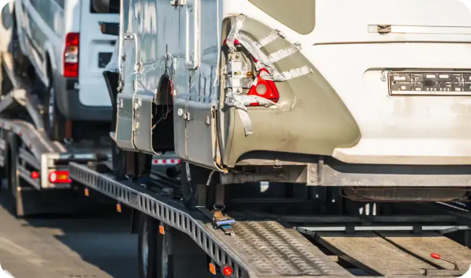 Vehicles secured on a car carrier